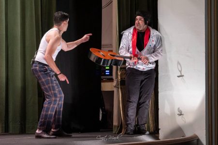 Actors in a theatrical performance at Fondazzjoni Teatrali Silvio Fleri Soler. Two actors performing on stage during a theatrical play.