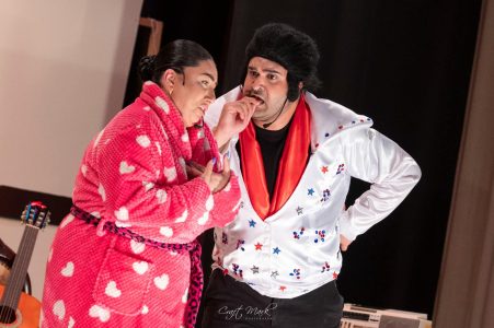 Actors in costume during a rehearsal at the theatre, preparing for a performance. Performers rehearsing a theatrical scene at Fondazzjoni Teatrali Silvio Fleri Soler.