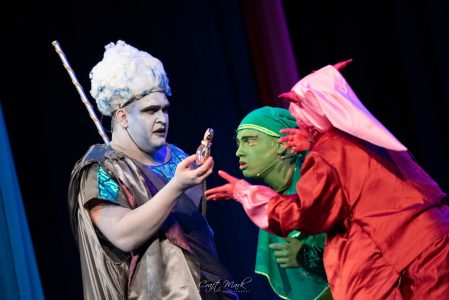 Actors dressed as mythical characters engaging in a theatrical scene at Fondazzjoni Teatrali Silvio Fleri Soler. Actors in colourful costumes performing on stage at Fondazzjoni Teatrali Silvio Fleri Soler.