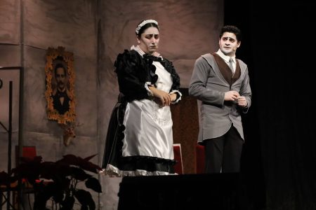 The image shows two actors in costume during a theatrical performance of Pantomima - Korps Brajd. Actors performing in Pantomima - Korps Brajd on stage.