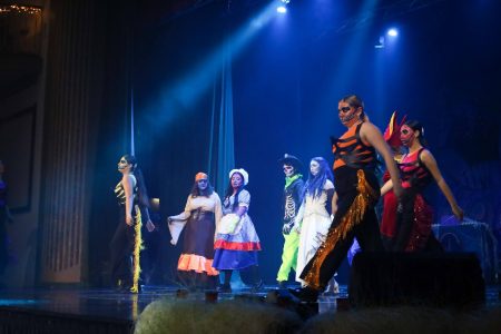 Vibrant scene from the Korps Brajd pantomime performance at Fondazzjoni Teatrali Silvio Fleri Soler. Performers in colourful costumes during a pantomime show.
